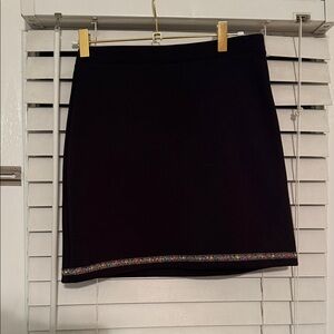 Chic Black Mini Skirt with Embellished Trim